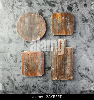 Set di diversi vecchi taglieri in legno Foto Stock