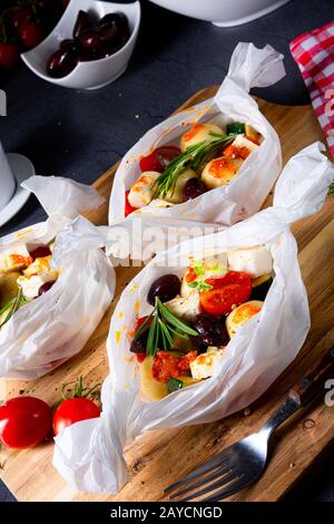 gnocchi al forno con pomodori zucchini e formaggio di pecora a dadini Foto Stock