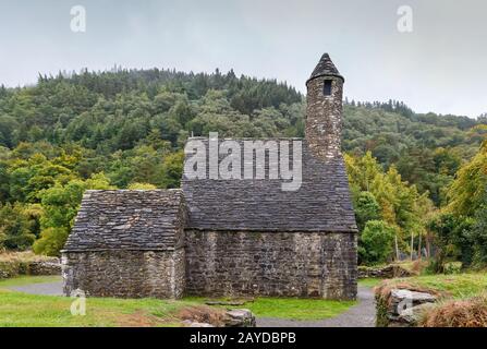 Chiesa di San Kevin a Glendalough, Irlanda Foto Stock