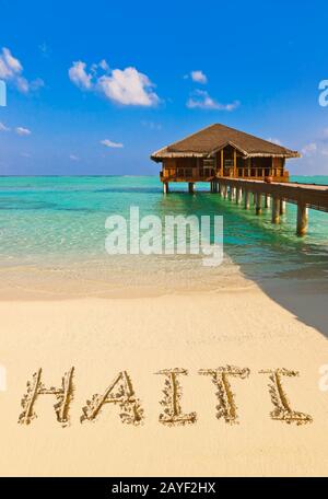 Parola Haiti sulla spiaggia Foto Stock