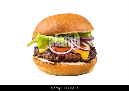 Appetitosi hamburger fatti in casa con insalata, pomodoro e formaggio su una tavola di legno. Chiudi la foto. Fast food Foto Stock