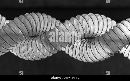 Spirale di condotti, ventilazione industriale astratto sfondo foto Foto Stock