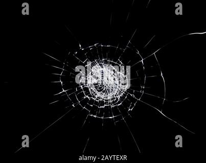 Incrinature e linee sul vetro rotto. Crepe sulla struttura della finestra. Foto Stock