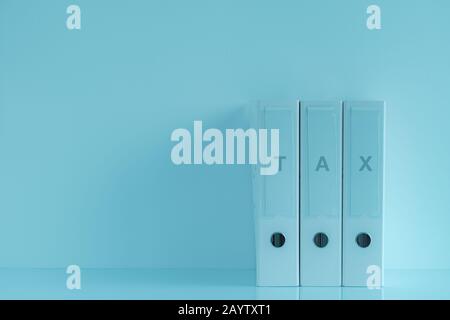 Tre raccoglitori ad anello per carte fiscali in ufficio con il muro come spazio di copia Foto Stock