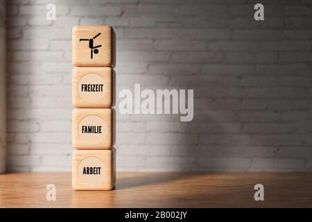 Blocchi di legno con le parole tedesche per TEMPO LIBERO, FAMIGLIA e LAVORO su superficie di legno - 3D rappresentazione resa Foto Stock