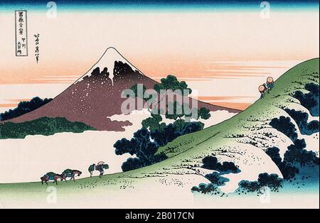 Giappone: «Inume Pass, Koshu». Ukiyo-e stampa in blocco della serie «trentasei viste del Monte Fuji» di Katsushika Hokusai (31 ottobre 1760 - 10 maggio 1849), 1830. “trentasei viste del Monte Fuji” è una serie di stampe in legno realizzate dall’artista giapponese Katsushika Hokusai. La serie raffigura il Monte Fuji in stagioni e condizioni meteorologiche diverse da una varietà di luoghi e distanze. Si compone di 46 stampe create tra il 1826 e il 1833. I primi 36 sono stati inclusi nella pubblicazione originale e, a causa della loro popolarità, altri 10 sono stati aggiunti dopo la pubblicazione originale. Foto Stock