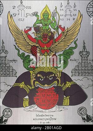 Thailandia: Una rappresentazione thailandese di Rahu, Snake Demon e cavarsio di eclissi solari e lunari, Wat Tai Mitra, Bangkok. Nella mitologia indù, Rahu è un serpente che inghiottisce il sole o la luna causando eclissi. È raffigurato nell'arte come un drago senza corpo che guida un carro disegnato da otto cavalli neri. Rahu è uno dei navagrahas (nove pianeti) in astrologia vedica. Il Rahu kala (ora del giorno sotto l'influenza di Rahu) è considerato inopportuno. Foto Stock