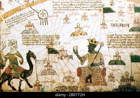 Mali: Mansa Musa (c. 1280-1337), re del Mali, con in mano uno scettro e un pezzo d'oro. Dettaglio dall'atlante catalano di Abraham Cresques, 1375. Musa i, comunemente indicata come Mansa Musa, era la decima mansa, che si traduce come "re dei re" o "imperatore", dell'Impero maliano. All'epoca dell'ascesa al trono di Mansa Musa, l'Impero Maliano consisteva in territori precedentemente appartenenti all'Impero Ghana e Melle (Mali) e nelle immediate aree circostanti. Musa deteneva molti titoli, tra cui Emiro di Melle, Signore delle miniere di Wangara, e conquistatore di Ghanata, Futa-Jallon e una dozzina di altri stati. Foto Stock