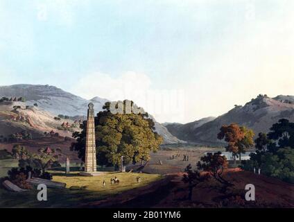 Etiopia/Regno Unito: "L'obelisco di Axum". Litografia di Henry Salt (1780-1827), 1810 circa. Il Regno di Aksum o Axum, noto anche come Impero Aksumita, era un'importante nazione commerciale nell'Africa nord-orientale, esistente circa dal 100-940 d.C. Crebbe dal periodo proto-aksumita dell'età del ferro intorno al IV secolo a.C. per raggiungere l'importanza nel i secolo d.C., e fu un attore importante nel commercio tra l'Impero Romano e l'antica India. I governanti aksumiti facilitarono il commercio coniando la propria valuta e lo stato stabilì la sua egemonia sul declino del regno di Kush. Foto Stock