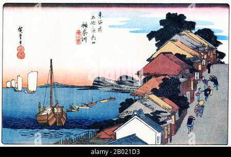 Giappone: "Stazione tre: Vista di Kanagawa al tramonto". Ukiyo-e xilografia della serie '53 stazioni della strada Tôkaidô' di Utagawa Hiroshige (1797-1858), 1834 circa. Kanagawa: Vista di una strada lungo la cima di una scogliera che si affaccia sulla baia di Edo, e di touts femminili che cercano di trascinare i viaggiatori nei residence. Questa stazione si trovava su una scogliera che si affacciava su un magnifico paesaggio marino di Edo Bay. Un lato dell'autostrada era fiancheggiato da due sale da tè a piani che dominavano la splendida baia. La terra è stata recuperata dalla baia vista nella foto e ora fa parte della città di Yokohama. Foto Stock