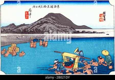 Giappone: 'Stazione Fifteen: Neve serale a Kanbara'. Ukiyo-e xilografia della serie '53 stazioni della strada Tôkaidô' di Utagawa Hiroshige (1797-1858), 1834 circa. Kambara: Un villaggio di montagna al calar della notte sotto la neve profonda, attraverso il quale tre persone si stanno affaticando, una con la testa sepolta in un ombrello mezzo aperto. Foto Stock