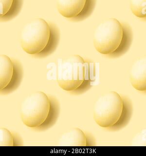 Le uova di colore giallo pastello sono senza cuciture isometriche. Concetto di Pasqua in bianco e nero. Moderno collage minimal food photography. Vista dall'alto, piatto Foto Stock