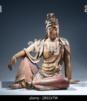 Guanshiyin o Avalokitesvara è il bodhisattva associato alla compassione venerata dai buddisti dell'Asia orientale, solitamente come una femmina. Il nome Guanyin è breve per Guanshiyin che significa 'Osservare I Suoni (o Grida) del mondo'. Alcuni buddisti credono che quando uno dei loro aderenti parte da questo mondo, essi sono posti da Guanyin nel cuore di un loto poi inviato a casa nella terra occidentale pura di Sukhavati. È generalmente accettato (nella comunità cinese) che Guanyin originò come il Sanscrito Avalokitesvara, che è la sua forma maschile. Comunemente conosciuta in inglese come la Dea di Me Foto Stock