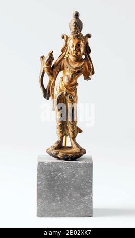 Guanshiyin o Avalokitesvara è il bodhisattva associato alla compassione venerata dai buddisti dell'Asia orientale, solitamente come una femmina. Il nome Guanyin è breve per Guanshiyin che significa 'Osservare I Suoni (o Grida) del mondo'. Alcuni buddisti credono che quando uno dei loro aderenti parte da questo mondo, essi sono posti da Guanyin nel cuore di un loto poi inviato a casa nella terra occidentale pura di Sukhavati. È generalmente accettato (nella comunità cinese) che Guanyin originò come il Sanscrito Avalokitesvara, che è la sua forma maschile. Comunemente conosciuta in inglese come la Dea di Me Foto Stock