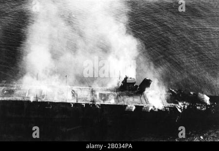 Hiryu ('Flying Dragon') era una portaerei costruita per la Marina Imperiale Giapponese (IJN) durante la 1930s. L'unica nave della sua classe, è stata costruita in un design Soryu modificato. Il suo aereo sostenne l'invasione giapponese dell'Indocina francese a metà del 1940. Durante il primo mese della guerra del Pacifico, ha partecipato all'attacco a Pearl Harbor e alla battaglia di Wake Island. La nave sostenne la conquista delle Indie Orientali Olandesi nel gennaio 1942. Il mese seguente, il suo aereo bombardò Darwin, Australia, e continuò ad assistere nella campagna olandese delle Indie Orientali. Nel mese di aprile, helpe aeromobile Hiryu Foto Stock