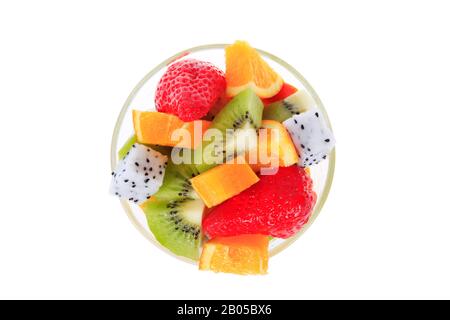 Frutti di drago, kiwi, fragole e arance, costituiti da un'insalata di frutta Foto Stock