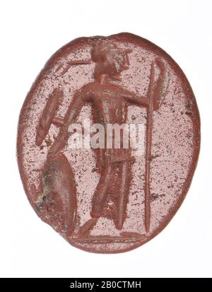 Figura femminile in piedi (Minerva) con casco in vista frontale di tre quarti con testa a destra. Nella mano sinistra ha una lancia e con la destra tiene uno scudo al suolo, linea di terra, gemma, intaglio, ringstone, pietra, jasper, colore: Rosso, opaco, Forma: Ovale, in piedi, Lavorato: Maaskant -Kleibink, M., Catalogo delle gemme incise nel Royal Coin Cabinet, 1978, pag.60, fig.2, tipo F4, 13 x 10 mm. Spessore 3,5 mm., Germania, sconosciuto, sconosciuto, Xanten Foto Stock