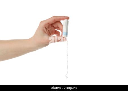 Mano femmina che tiene il tampone, isolato su sfondo bianco Foto Stock