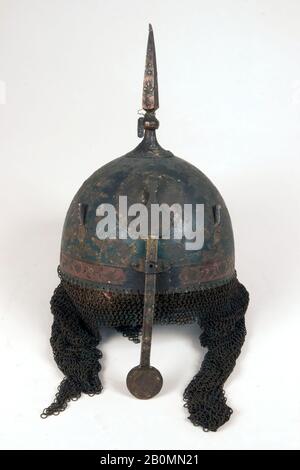 Casco e protezione braccio, persiano, 19th secolo, persiano, acciaio, smalto, Casco (a); diam. 8 poll. (20,3 cm); H. 11" (27,9 cm); Peso 64,2 once (1820 g); protezione braccio (b); L. 21 3/4 in. (55,2 cm); W. 4 5/16 in. (11 cm); Peso 1 lb. 100 ml (623,7 g), Caschi Foto Stock