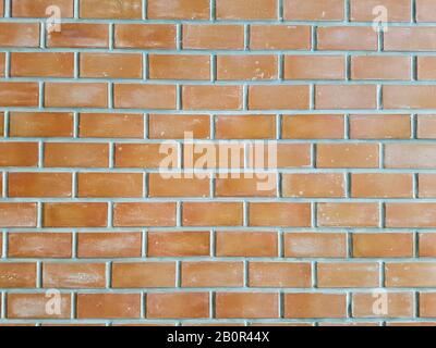 Sfondo di astratto vecchio grunge rosso mattone struttura modello muro. Ottimo per iscrizioni graffiti. Foto Stock