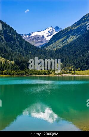 Wildgerlossee con vista sul Reichenspitze, Wildgerlostal, Krimml, Pinzgau, Land Salzburg, Austria Foto Stock