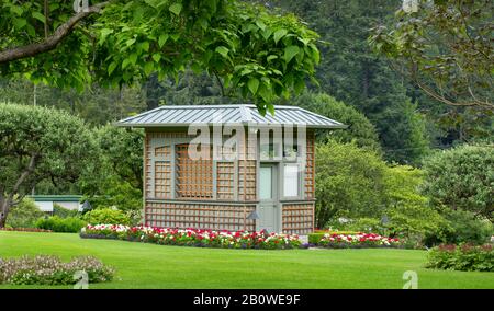 Una bella casa giardino nei Butchart Gardens Foto Stock