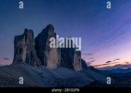 Tre Pinnacoli Al Tramonto, Tre Picchi Parco Naturale, Dolomiti Sexten, Alto Adige, Italia Foto Stock