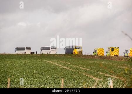 Boscombe Down, Amesbury, UK, 22nd Feb 2020, I Passeggeri lasciano Boscombe Giù in autobus per Arrowe Park a Wirral. Credito: Simon Ward/Alamy Live News Foto Stock