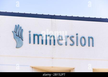 18 febbraio 2020 San Jose / CA / USA - Logo Immersion presso la sede centrale di Silicon Valley; Immersion Corporation è uno sviluppatore e licenziante di touch fe Foto Stock