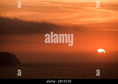 Sequenza di immagini di un tramonto, sul mare, tramonto sequenza, Whitby, North Yorkshire, Inghilterra Foto Stock