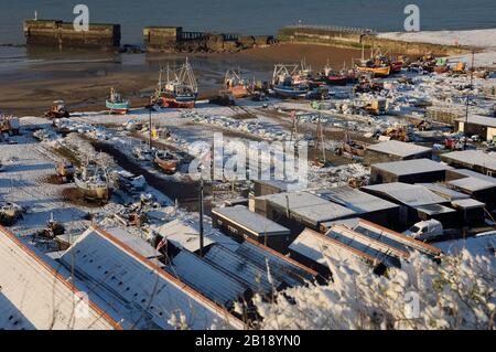 Neve scena di Hastings flotta di pesca, East Sussex, Inghilterra, Regno Unito Foto Stock