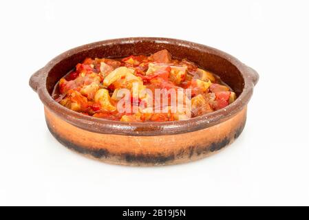 Trippa uno stufato Madrileniano in un vaso di argilla. Foto Stock