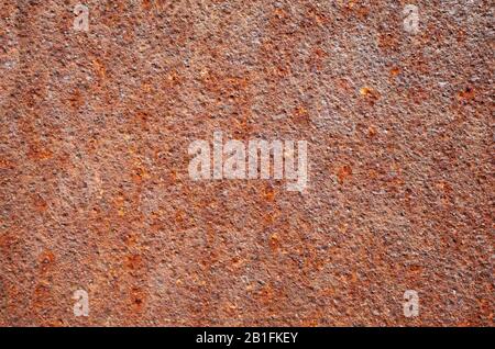 Parete arrugginita, fondo o texture. Foto Stock
