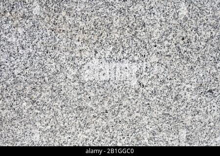 Granito igneous texture roccia sulla superficie di gneiss, punteggiato modello di trasformazione della roccia come sfondo, mascherina per l'arte Foto Stock