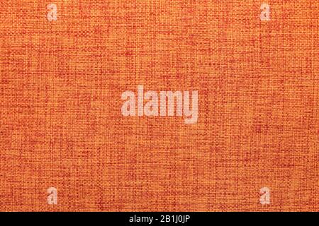 Tessuto a griglia arancione con rivestimento a posa piatta. Astratto trendy texture sfondo moderno Foto Stock