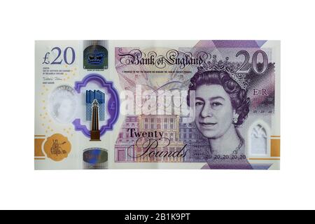 Una nuova nota in plastica £20 su uno sfondo bianco Foto Stock