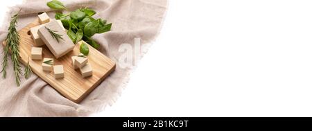 Cucina italiana vegetariana. Spinaci, rosmarino e tofu Foto Stock