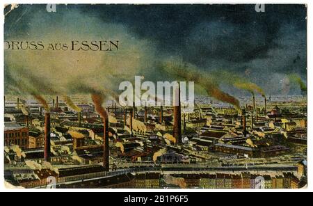 "Saluti da Essen". Città industriale con camini fumanti , (cartolina, ) Foto Stock