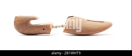 Legno albero di scarpe. Primo piano isolato su sfondo bianco Foto Stock