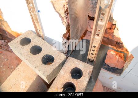 Primo piano di mattoni e muro Foto Stock