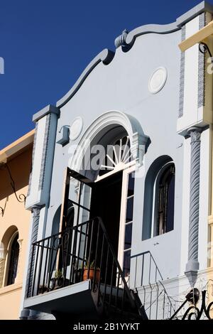 Uno degli splendidi edifici color pastello di New Regent Street, Christchurch, Nuova Zelanda Foto Stock