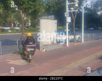 Shunfeng corriere per le strade di Shenzhen Foto Stock