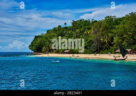 L'Isola Doini si trova nel cuore della Baia di Milne, sulla punta orientale di Papua Nuova Guinea. Questa piantagione è stata originariamente esaminata da un governo sur Foto Stock