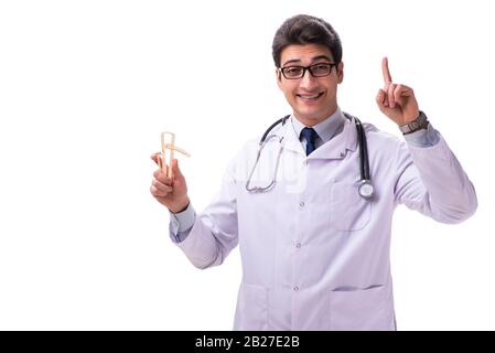 Il giovane maschio medico con calibri isolato su bianco Foto Stock
