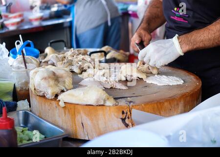 Pollo al vapore con riso al ristorante, pollo Hainan Foto Stock