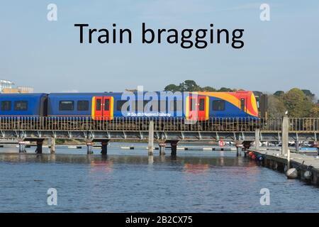 Immagine del concetto di formazione di bragging - utilizzo di treni invece di volare per ridurre l'ingombro di carbonio Foto Stock
