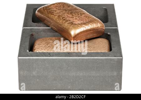 stampi in grafite con barre di rame isolate su fondo bianco Foto Stock