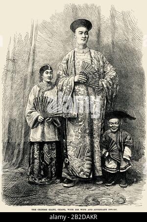 Il gigante cinese, Chang, con sua moglie e nano attendente Foto Stock