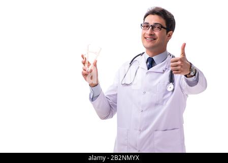 Il giovane maschio medico con calibri isolato su bianco Foto Stock