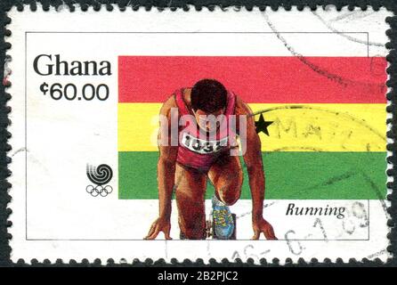 Ghana - CIRCA 1989: Un francobollo stampato in Ghana, dedicato alle Olimpiadi estive di Seoul 1988, raffigurato corridore, circa 1989 Foto Stock